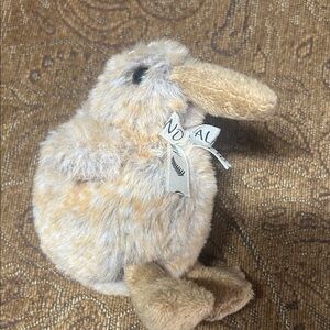 Kiwi Brand Keychain with Brown and Black Design